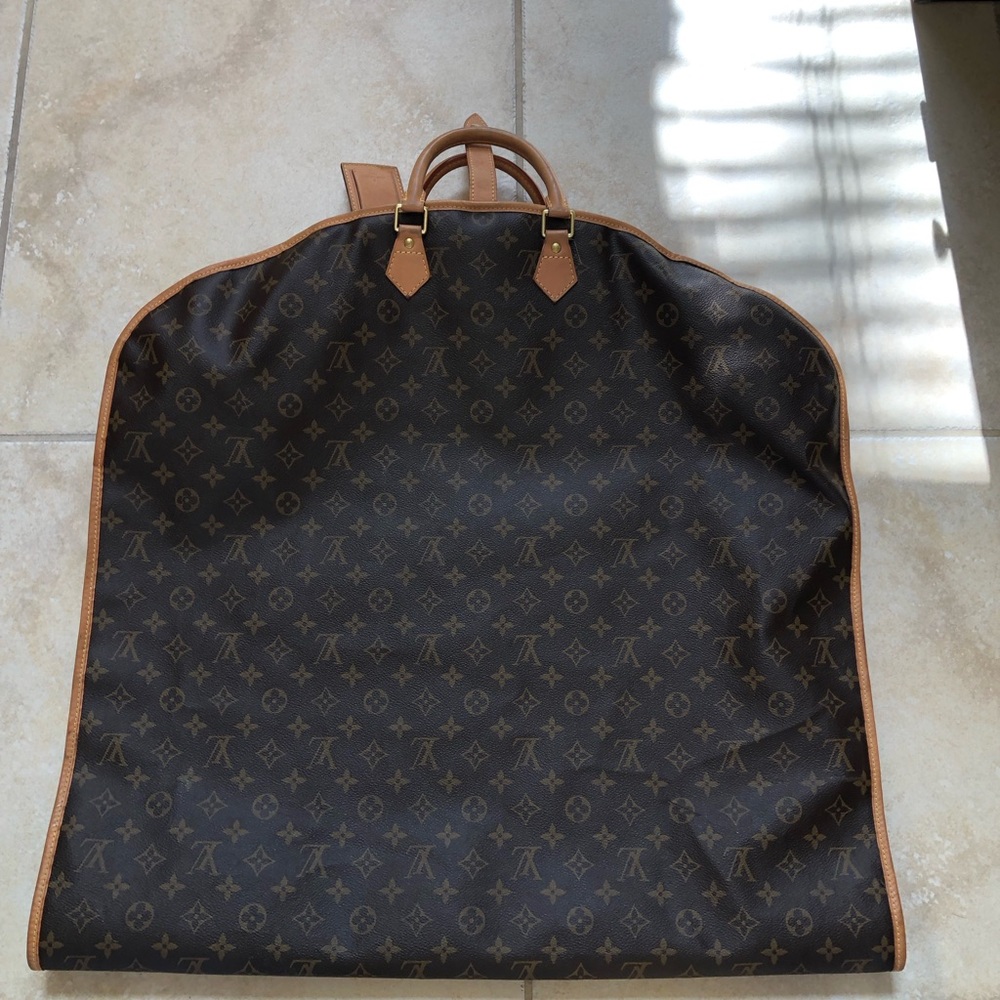 Authentic Louis Vutton garment travel bag.  Brown/leather